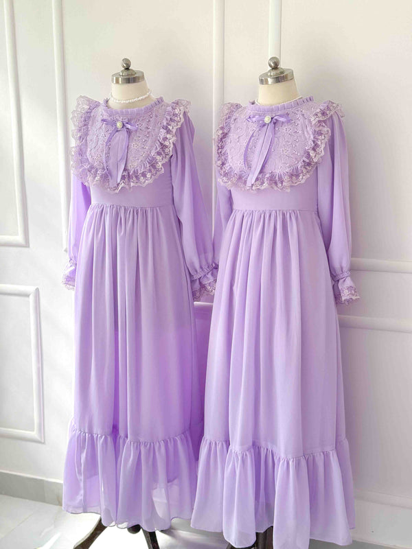 Iris with Lace Adorned High Neckline