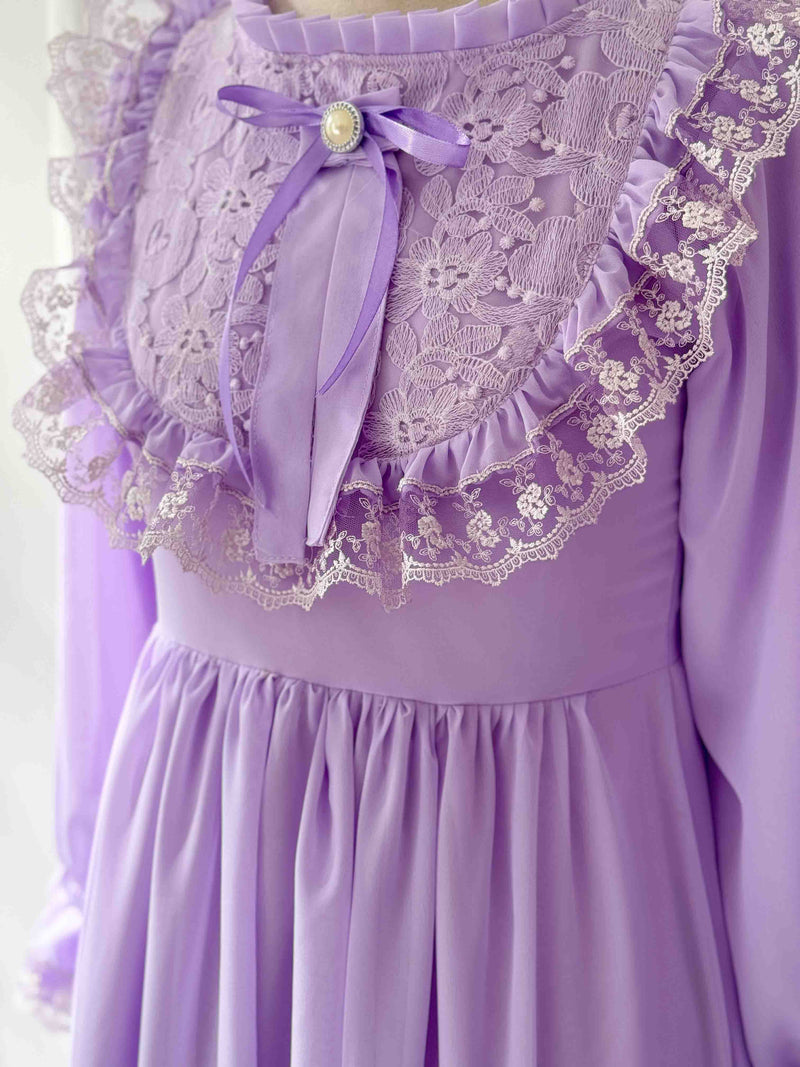 Iris with Lace Adorned High Neckline