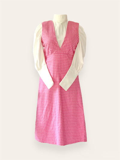 V neck plaid pinafore dress with puffy sleeved white turtleneck